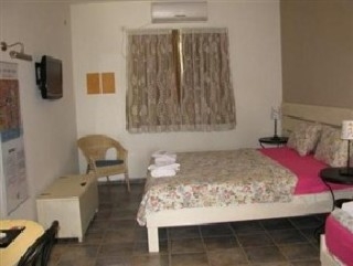 Imagen de la habitación del Hotel Kibbutz Country Lodging Golan Rooms. Foto 12