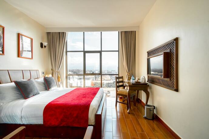 Imagen de la habitación del Hotel Kibo Palace Moshi. Foto 13