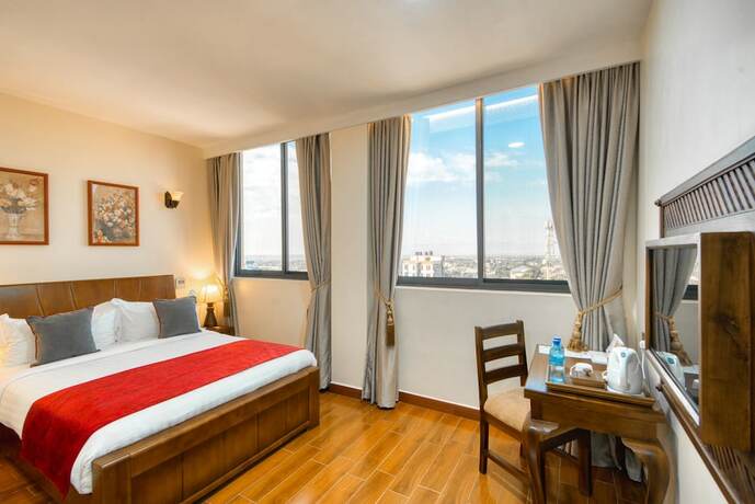 Imagen de la habitación del Hotel Kibo Palace Moshi. Foto 17