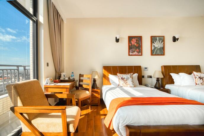 Imagen de la habitación del Hotel Kibo Palace Moshi. Foto 19