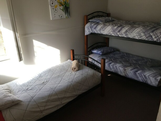Imagen de la habitación del Hotel Kickback Cottages. Foto 20