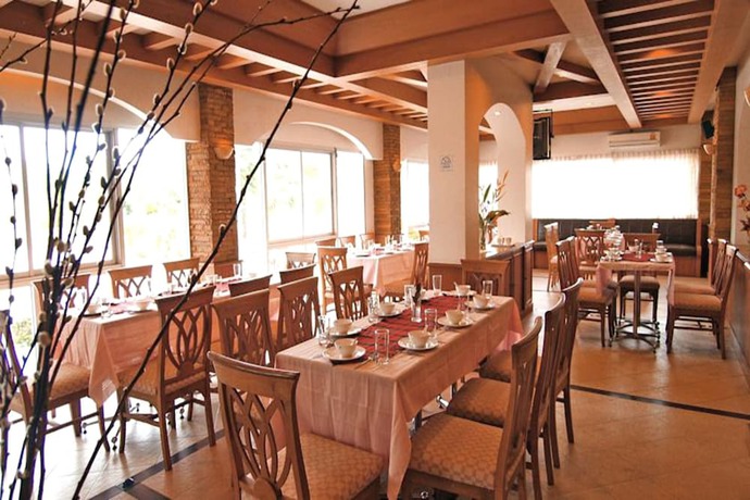 Imagen del bar/restaurante del Hotel Kiengpiman Hotel. Foto 2