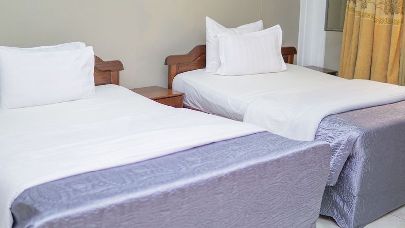 Imagen de la habitación del Hotel Kigali Holiday. Foto 16