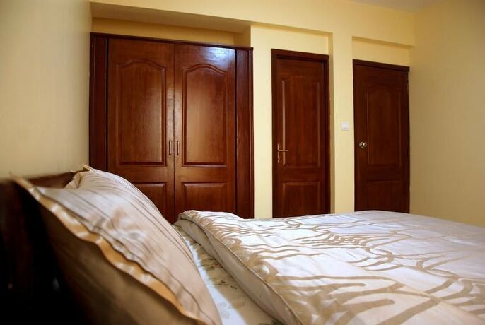 Imagen de la habitación del Hotel Kigali Village Suites, Kigali. Foto 13