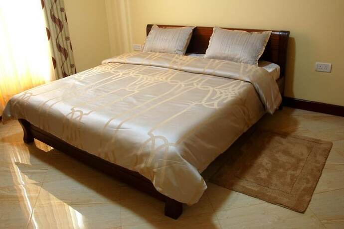 Imagen de la habitación del Hotel Kigali Village Suites, Kigali. Foto 14