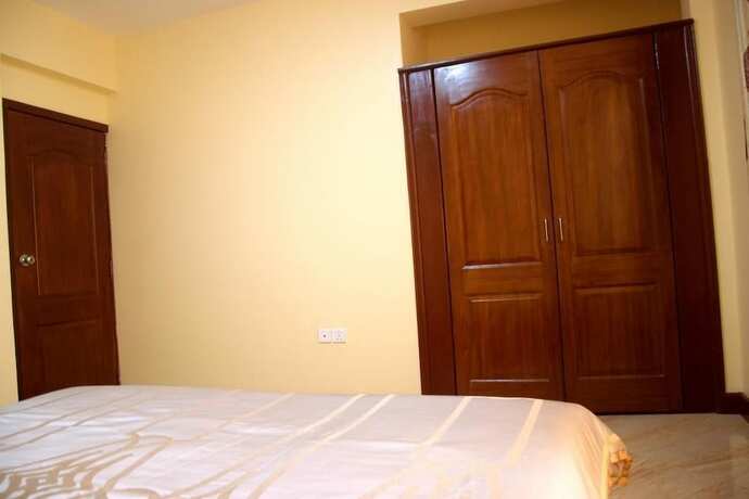 Imagen de la habitación del Hotel Kigali Village Suites, Kigali. Foto 16