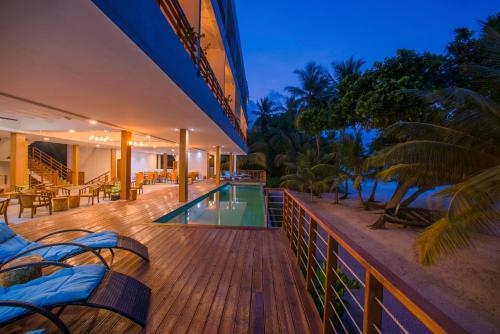 Imagen de la habitación del Hotel Kiha Beach. Foto 8