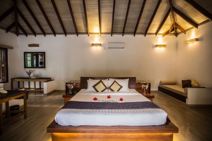 Imagen de la habitación del Hotel Kihaa Maldives. Foto 14