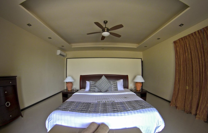 Imagen de la habitación del Hotel Kihaa Maldives. Foto 18