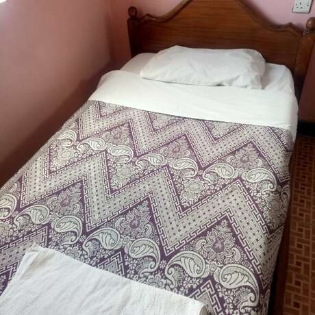Imagen de la habitación del Hotel Kihome Inn Lodge. Foto 13
