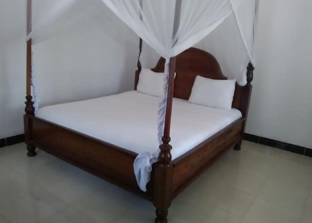 Imagen de la habitación del Hotel Kihori Bungalows. Foto 15