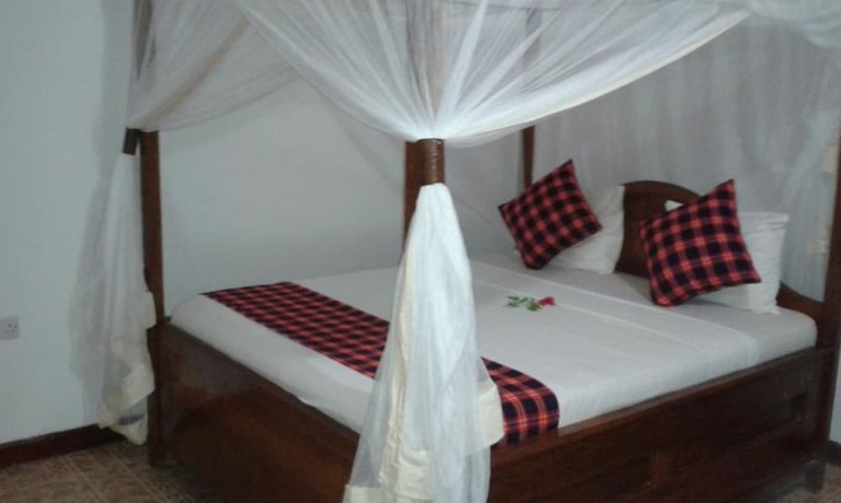 Imagen de la habitación del Hotel Kihori Bungalows. Foto 17