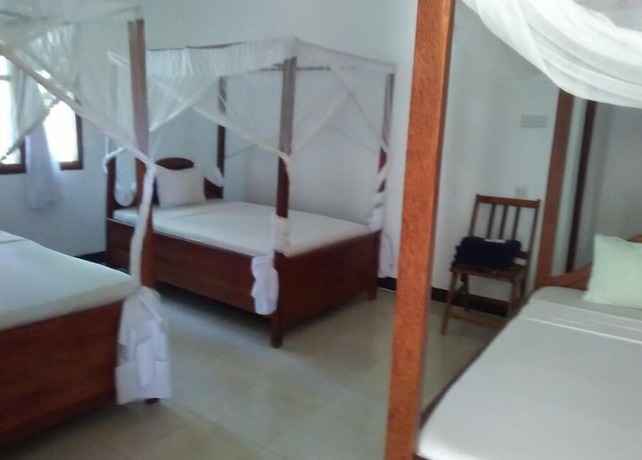 Imagen de la habitación del Hotel Kihori Bungalows. Foto 18