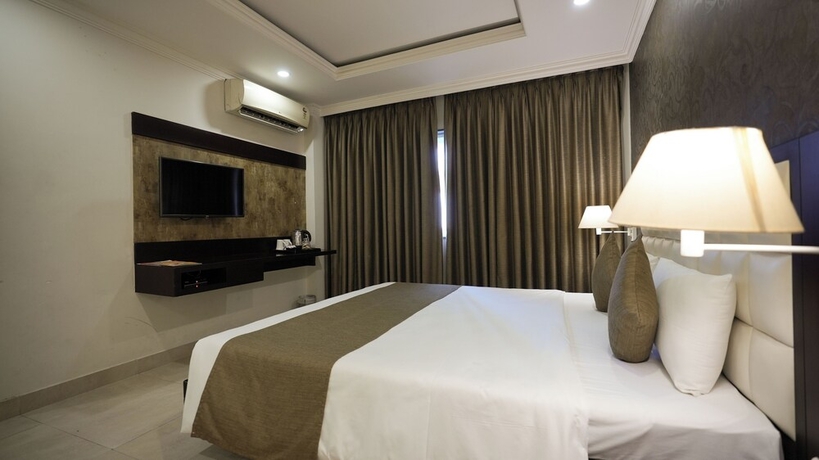 Imagen de la habitación del Hotel Kiit Residency. Foto 13