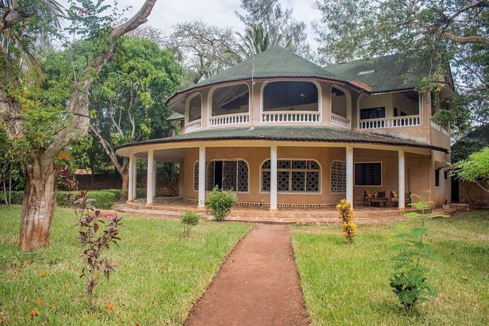 Imagen de la habitación del Hotel Kijani Cottages Diani. Foto 19
