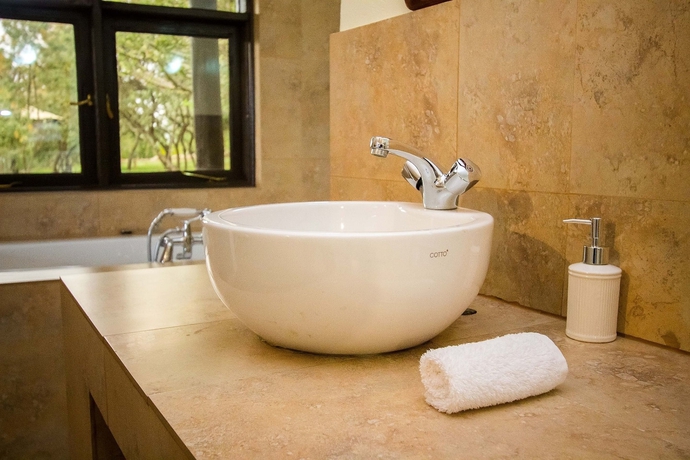 Imagen de la habitación del Hotel Kika Lodge. Foto 5