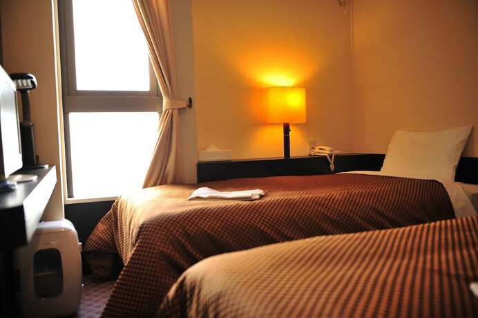Imagen de la habitación del Hotel Kikuei Namba. Foto 16