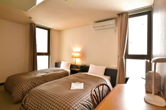 Imagen de la habitación del Hotel Kikuei Namba. Foto 18