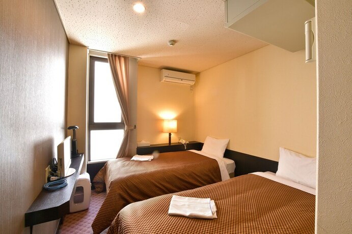 Imagen de la habitación del Hotel Kikuei Namba. Foto 20