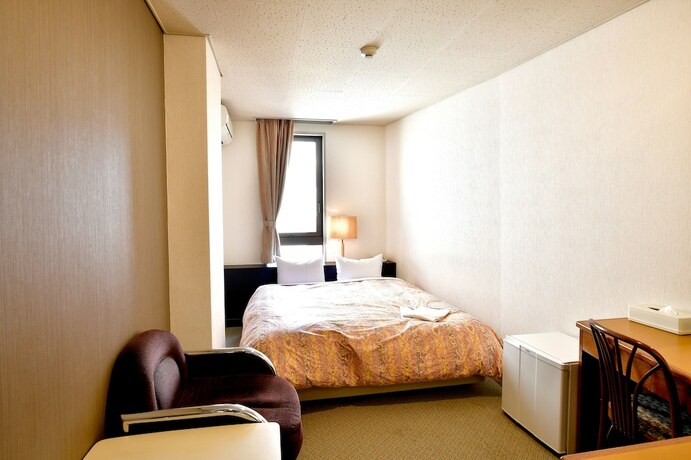 Imagen de la habitación del Hotel Kikuei Namba. Foto 21