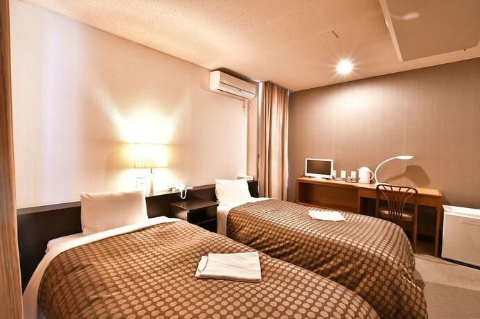 Imagen de la habitación del Hotel Kikuei Namba. Foto 22