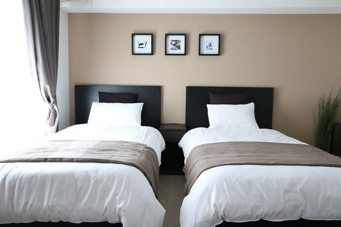 Imagen de la habitación del Hotel Kiku's Room Kaiyukan. Foto 16