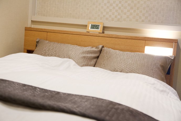Imagen de la habitación del Hotel Kikusui Imabari. Foto 12