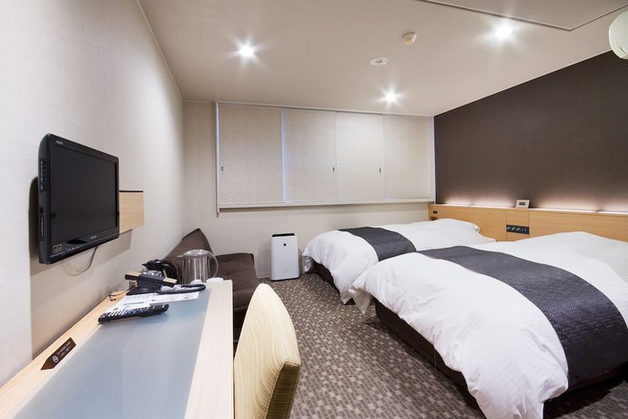 Imagen de la habitación del Hotel Kikusui Imabari. Foto 16