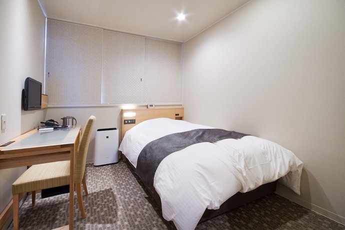 Imagen de la habitación del Hotel Kikusui Imabari. Foto 17
