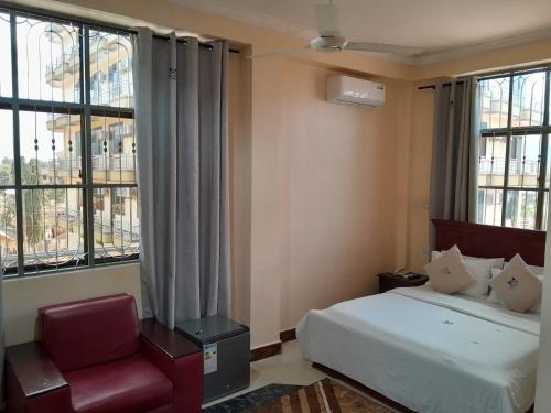 Imagen de la habitación del Hotel Kilema Executive. Foto 19