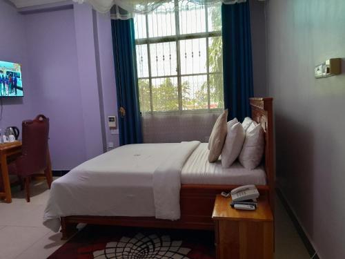 Imagen de la habitación del Hotel Kilema Executive. Foto 20