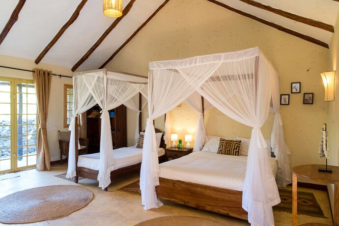 Imagen de la habitación del Hotel Kili Villa. Foto 13