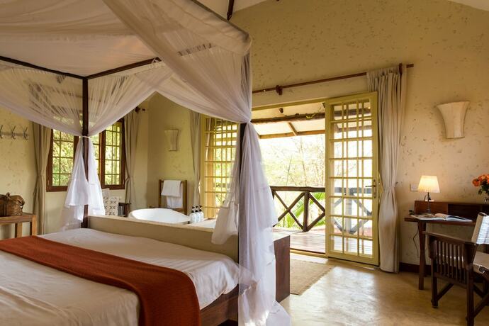 Imagen de la habitación del Hotel Kili Villa. Foto 14