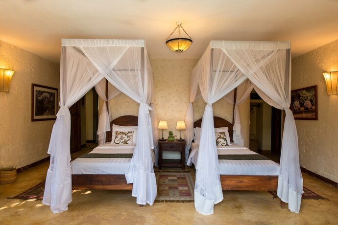 Imagen de la habitación del Hotel Kili Villa. Foto 19