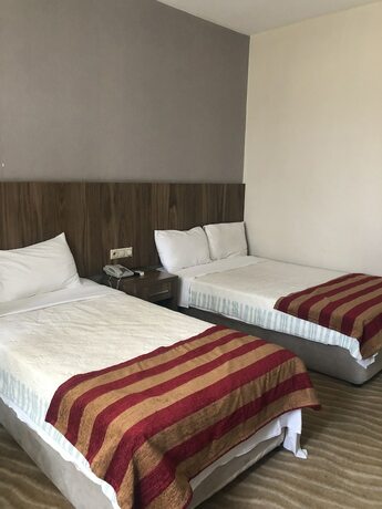 Imagen de la habitación del Hotel Kilim Otel. Foto 17