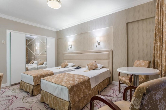 Imagen de la habitación del Hotel Kilim Otel Izmir. Foto 5