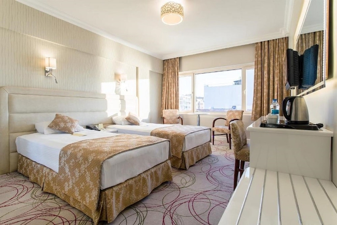 Imagen de la habitación del Hotel Kilim Otel Izmir. Foto 7