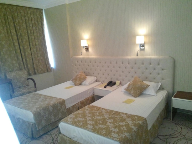 Imagen de la habitación del Hotel Kilim Otel Izmir. Foto 9