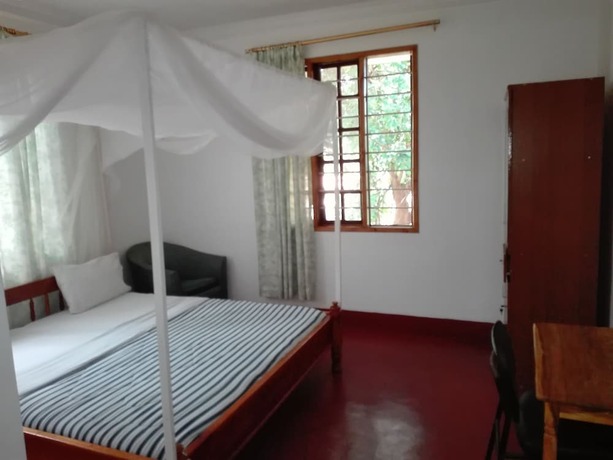 Imagen de la habitación del Hotel Kilimanjaro Safaris Lodge. Foto 18