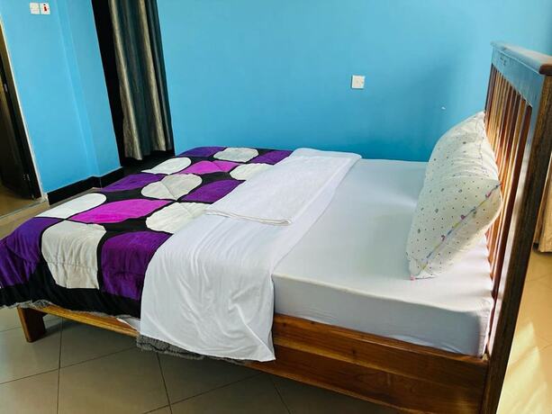 Imagen de la habitación del Hotel Kilimanjaro Smiley Inn. Foto 5