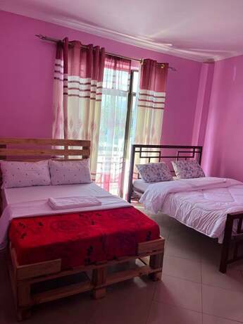 Imagen de la habitación del Hotel Kilimanjaro Smiley Inn. Foto 7
