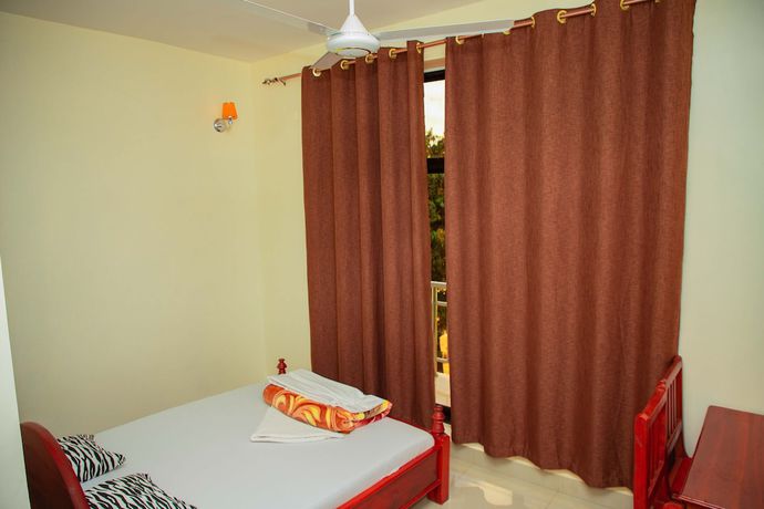 Imagen de la habitación del Hotel Kilimanjaro White House. Foto 7