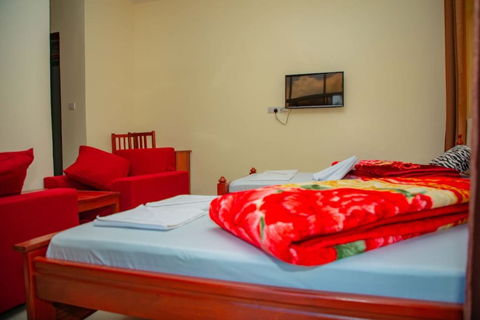Imagen de la habitación del Hotel Kilimanjaro White House. Foto 9