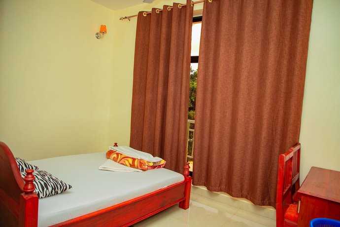 Imagen de la habitación del Hotel Kilimanjaro White House. Foto 12