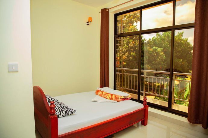 Imagen de la habitación del Hotel Kilimanjaro White House. Foto 13