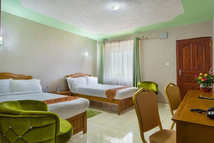 Imagen de la habitación del Hotel Kilimo Grand Resort. Foto 16