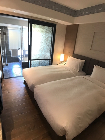 Imagen de la habitación del Hotel Kilin Jiaoxi. Foto 15