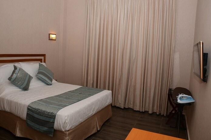 Imagen de la habitación del Hotel Kim, Kigali. Foto 15