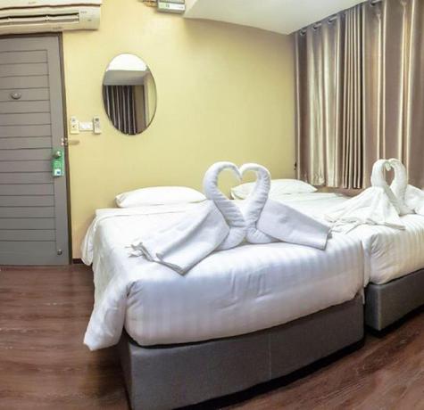 Imagen de la habitación del Hotel Kim Korner Pratunam Hotel. Foto 6