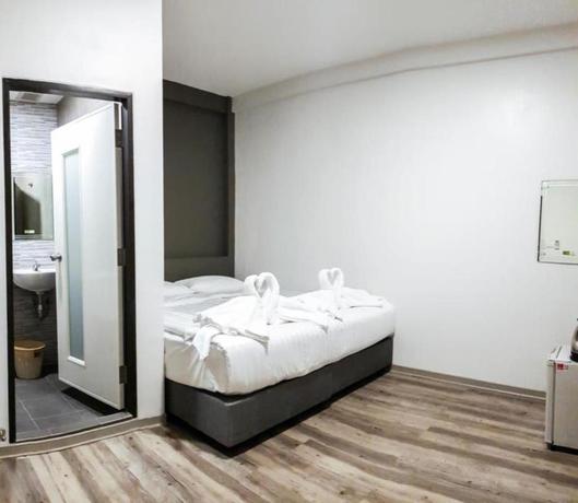 Imagen de la habitación del Hotel Kim Korner Pratunam Hotel. Foto 7